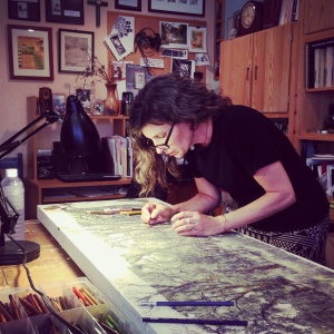 Judith Monroe working in her art studio 2013